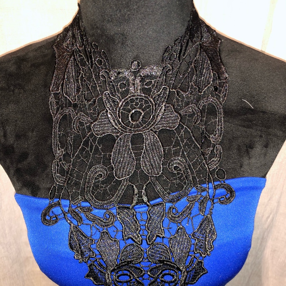 Flirty blue mini with black lace detail.